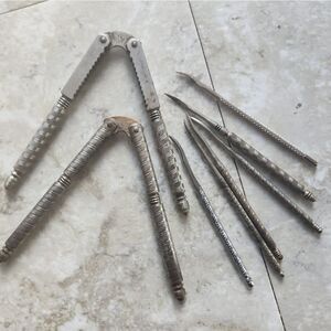 Silver metal Vintage Embossed Nutcracker & Six Picks set